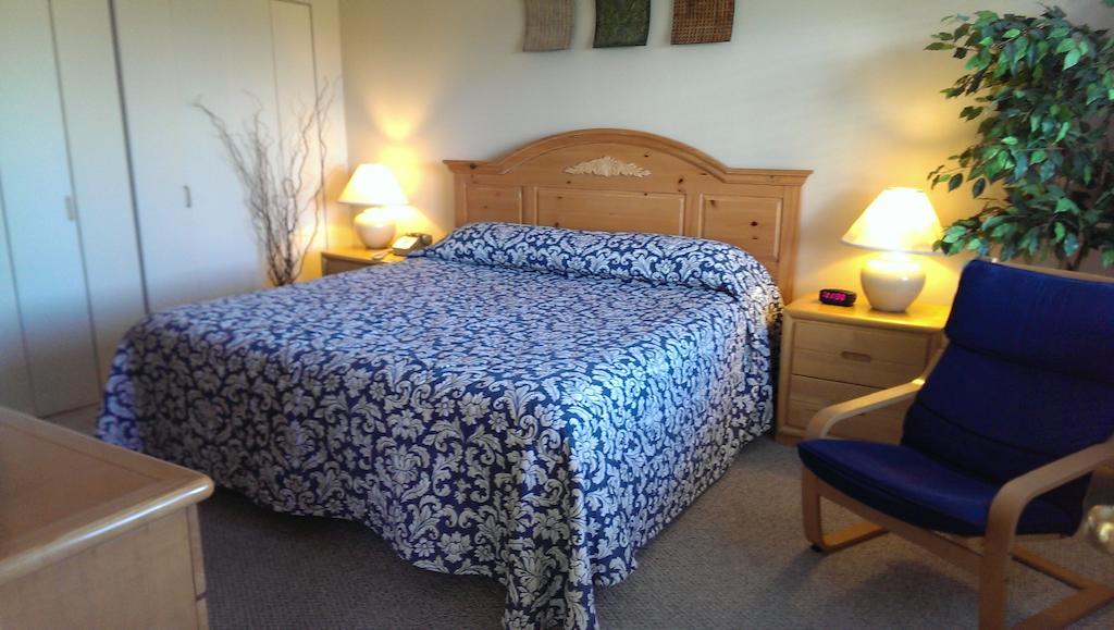 Montauk Manor Hotell Rom bilde A bed with a duvet